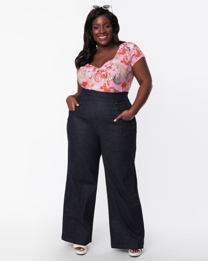 Front of a model wearing a size 5X Unique Vintage Blue Denim High Waist Ginger Jeans in Blue by Unique Vintage. | dia_product_style_image_id:288885
